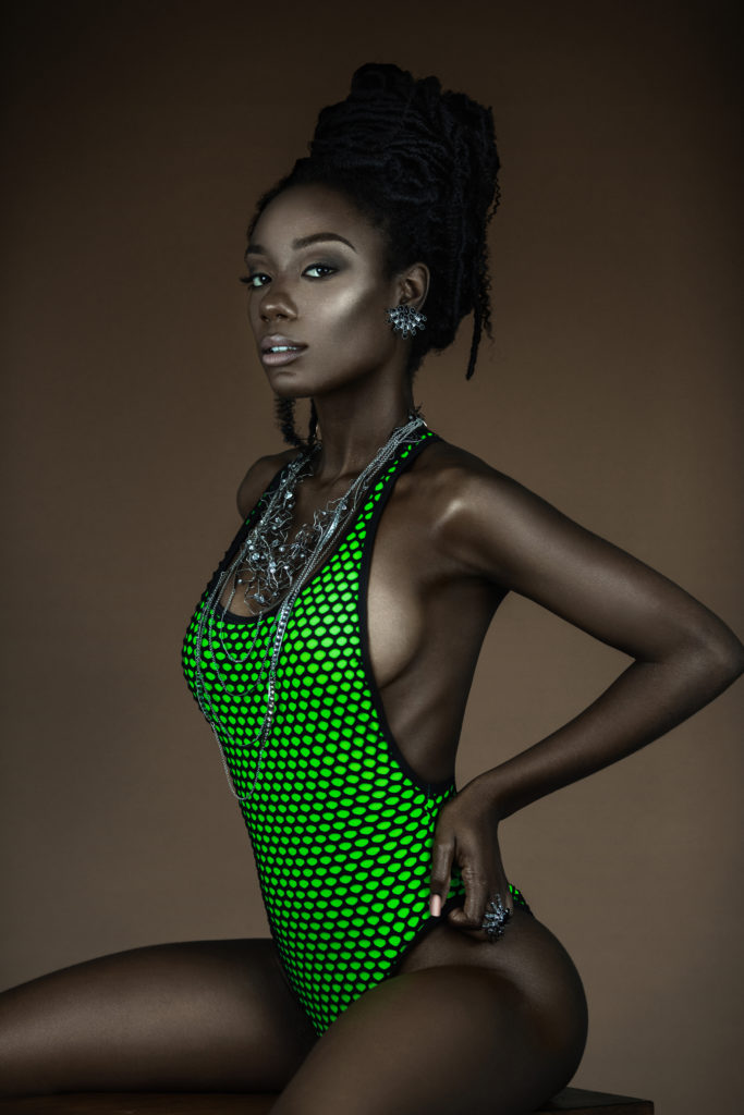 Sensual Young Black Lady In Green Bathing Suit