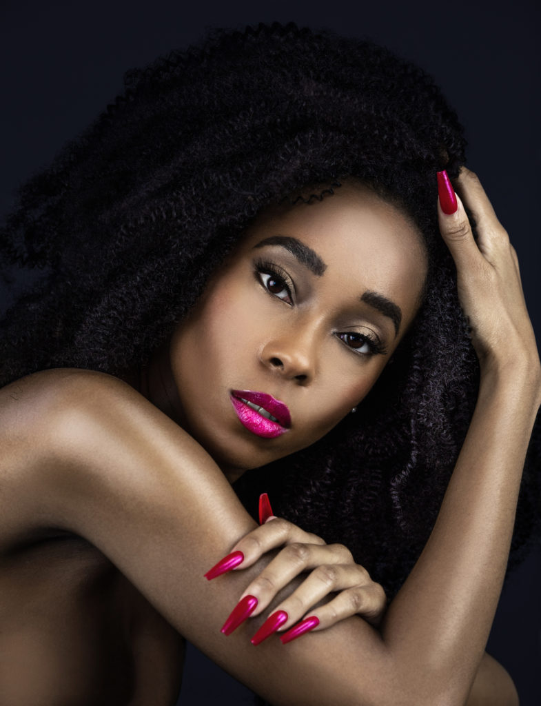 Curly Sexy Black Lady with Fuchsia Lipstick & Nails