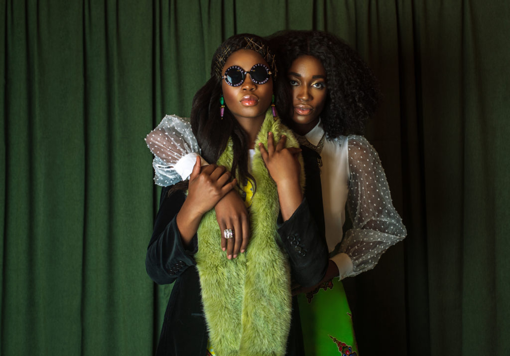 Two Attractive Black Ladies in African Designer Clothing
