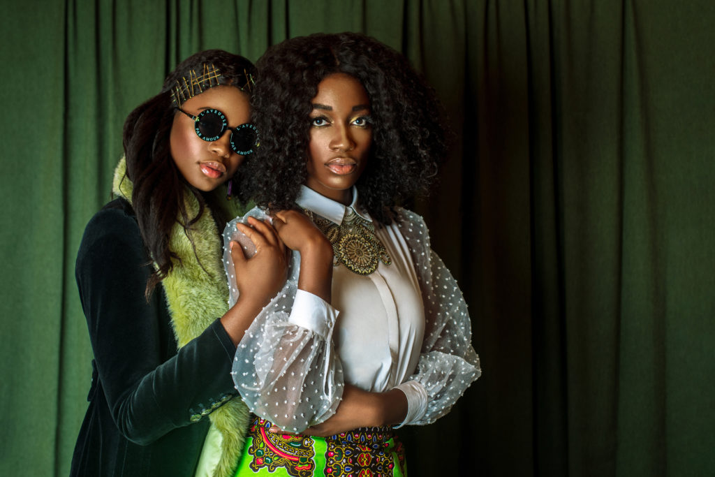 Two Beautiful Black Ladies in African Designer Clothing