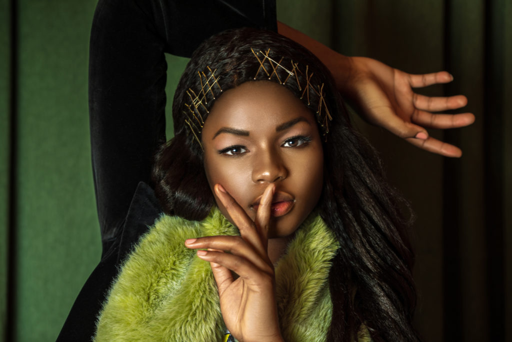 Sexy Black Lady with Green Fur Coat