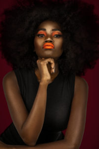 Clean & Serene Black Lady With Big Afro & Orange Lips