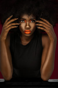 Clean & Serene Black Lady With Big Afro & Black Nails