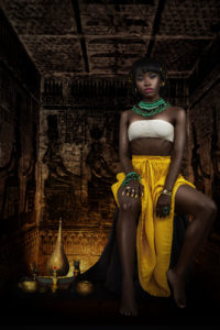 Female Egyptian Pharaoh Sitting In Her Tomb