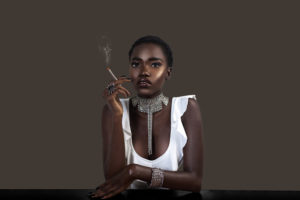 Joint Smoking Sensual Black Lady in Silver Jewelry
