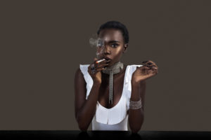 Joint Smoking Beautiful Black Lady in Silver Jewelry