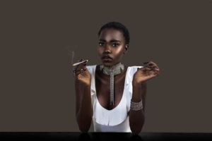 Joint Smoking Sophisticated Black Lady in Silver Jewelry