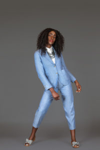 Sensual Black Woman in Blue Suit