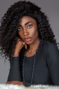Attractive Black Woman in Black Long Sleeve