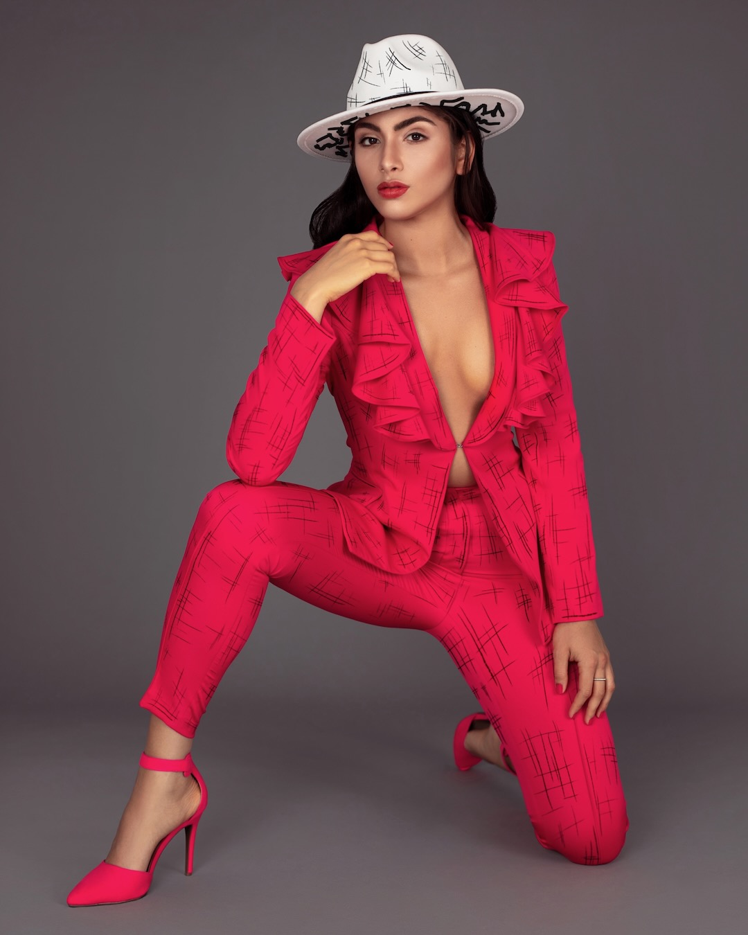 Lady In Pink Suit